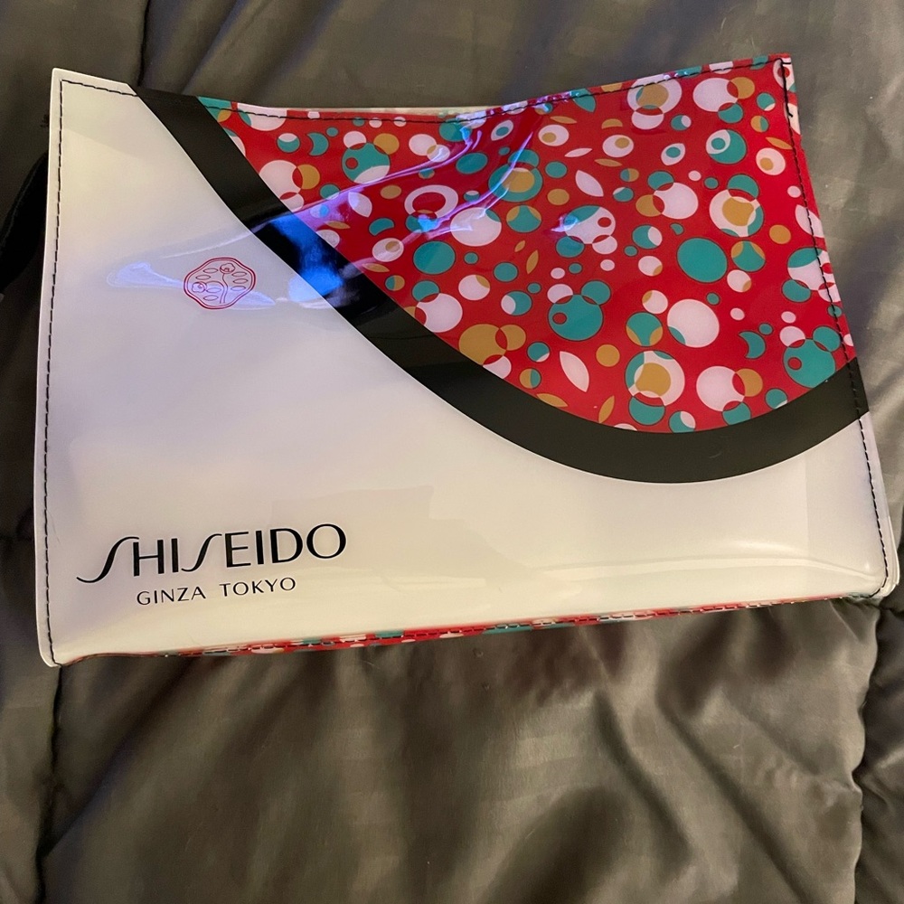 Shiseido Gonzalo Tokyo cosmetics bag with samples include